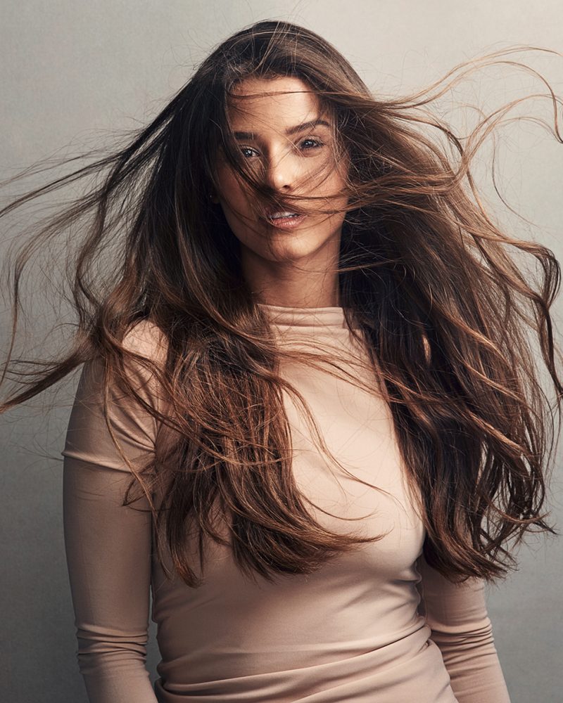 beautiful-woman-with-flowing-hair-in-studio-2026-03-25-02-17-16-utc.jpg
